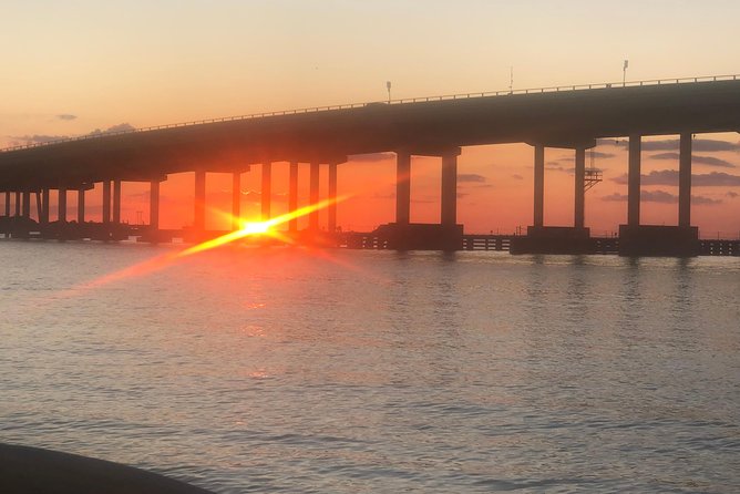 Sunset Dolphin Watching Cruise in Destin Harbor - Booking, Weather, and Cancellation Details
