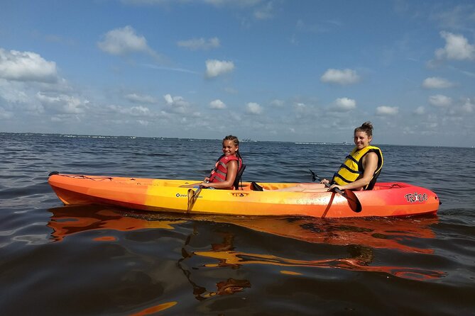 Sunset kayaking tour at Manatee Cove with Manatee & Dolphin sightings - Getting started with a single or tandem kayak