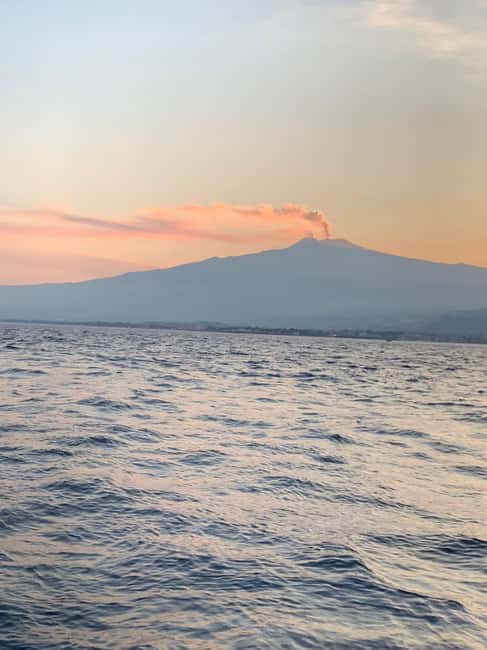 Sunset tour in search of dolphins with aperitif - Meeting at Via Vulcano and boarding in Giardini Naxos