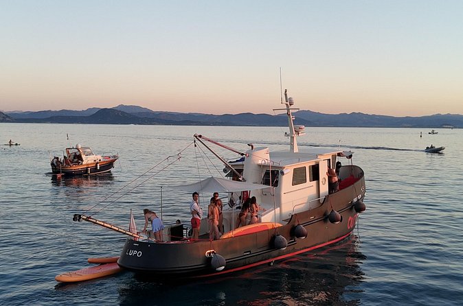Sunset with dolphins on a vintage tugboat in Golfo Aranci - Should you book this sunset tugboat trip?