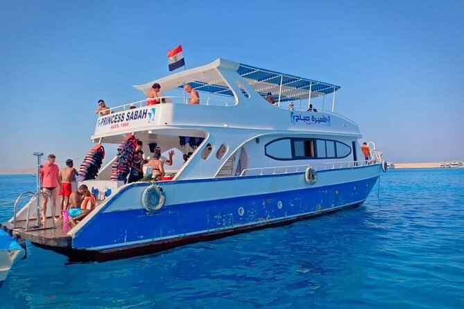 Swimming with Dolphins and Banana Boat Sea Trip Day Experience - Hurghada - Two coral-reef snorkeling stops