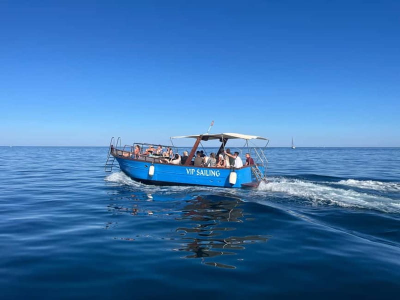Taormina: Dolphin Tour and Sunset Aperitif Boat Tour - Sicilian snacks as the sky changes color