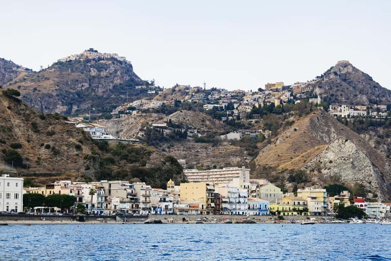 Taormina: Sunset Boat Tour with Dolphin Watching & Aperitif - Swimming and snorkeling in Taormina Bay