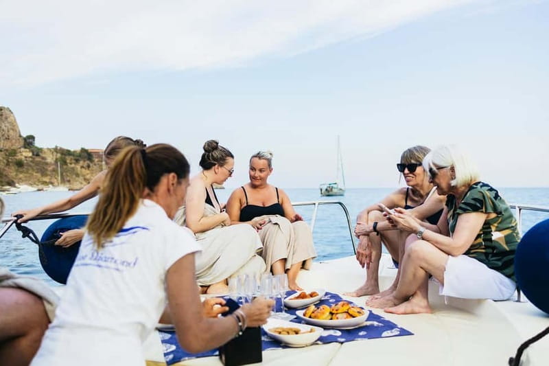 Taormina: Sunset Boat Tour with Dolphin Watching & Aperitif - Searching for dolphins in the open water