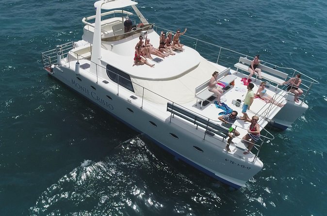 Whale and Dolphin Watching Catamaran with Transfer and Buffet - Coastal views on the return sail