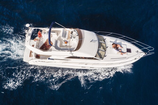 Whales and Dolphins excursion on a Luxury Yacht in Canary Islands - Coastal views with Mount Teide in the distance
